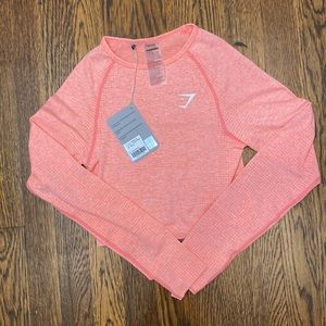 Gymshark basic seamless long sleeve crop top in peach pink marl size small